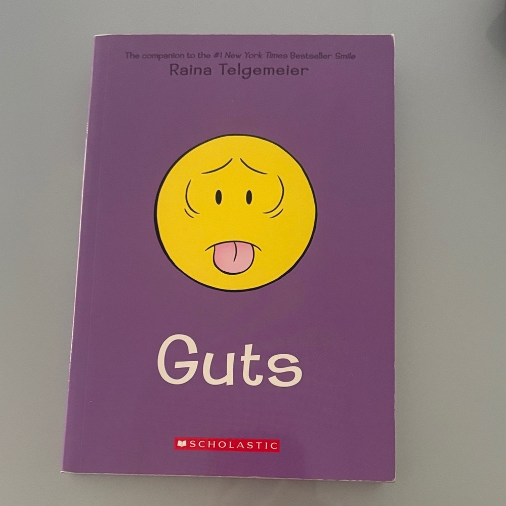 Scholastic Guts Book with Purple and Yellow Cover